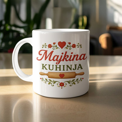 White mug with "Majkina KUHINJA" text, hearts, flowers and rolling pin design.