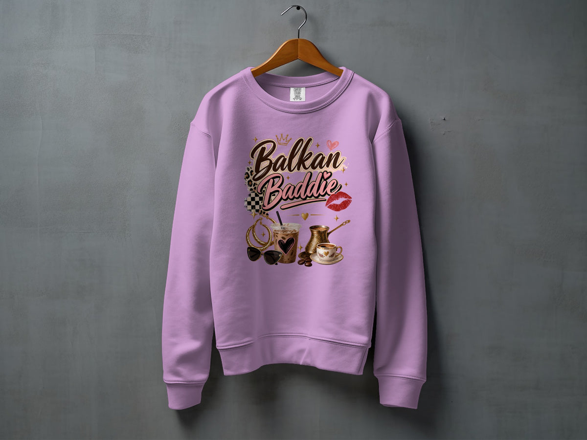 Lavender crewneck sweatshirt with "Balkan Baddie" text and coffee-themed graphics.