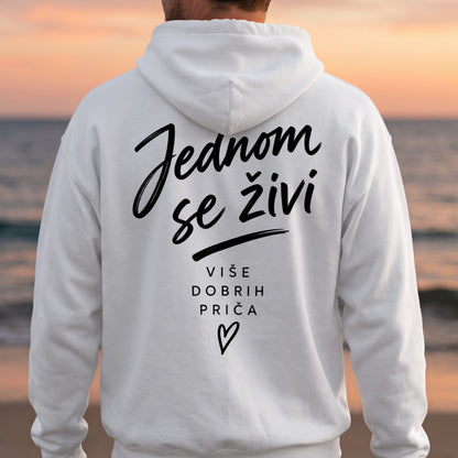 White hoodie with black text: "Jednom se živi" and "VIŠE DOBRIH PRIČA".