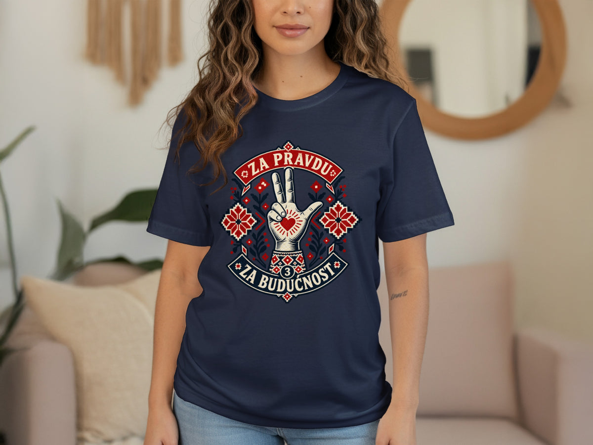 A woman wearing a dark blue t-shirt featuring a stylized hand graphic and the text ZA PRAVDU ZA BUDUCNOST.