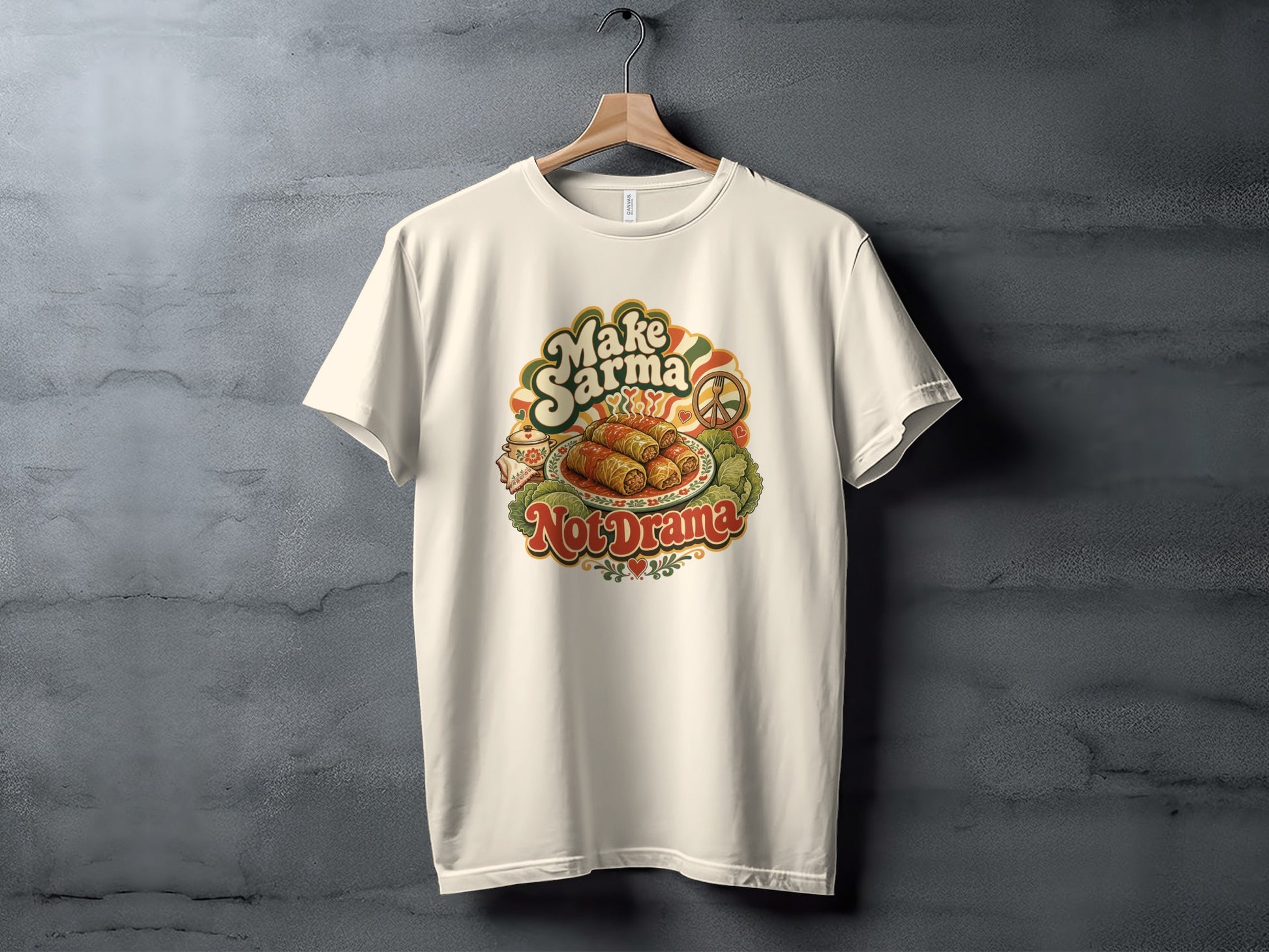 Cream t-shirt with "Make Sarma Not Drama" text and a sarma illustration.
