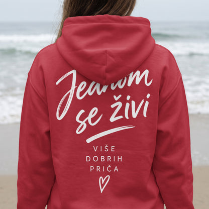 Red hoodie with white text: "Ježom se živi, Više dobrih priča" and a heart.