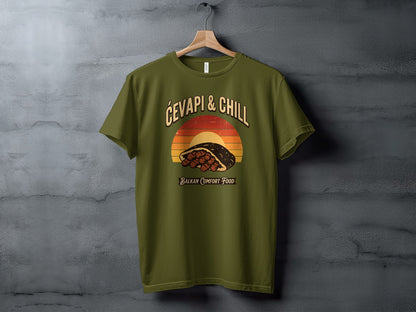 Green t-shirt with "Ćevapi & Chill Balkan Comfort Food" and graphic of ćevapi.