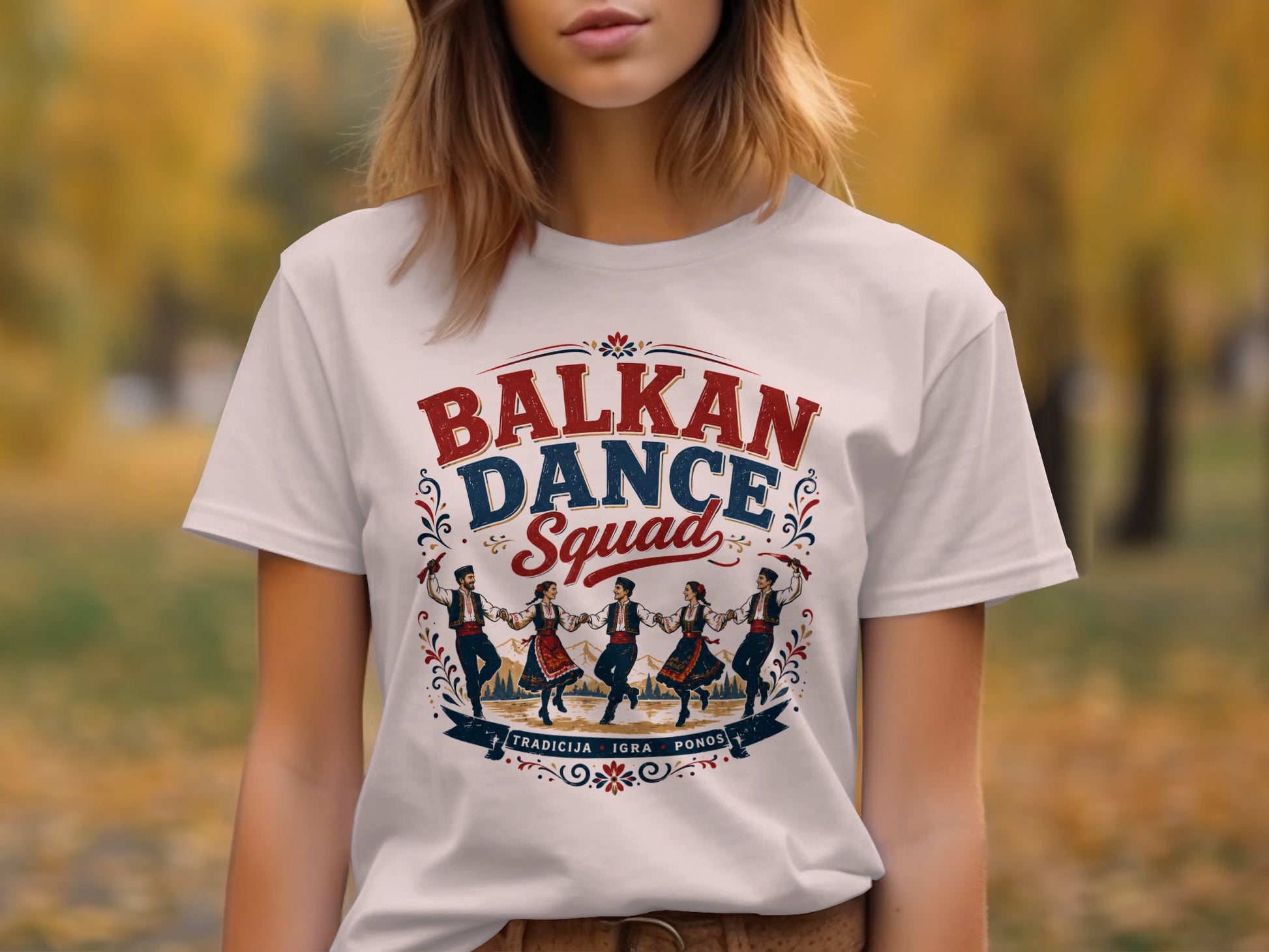White t-shirt with "BALKAN DANCE Squad" text and traditional dancers at the bottom.