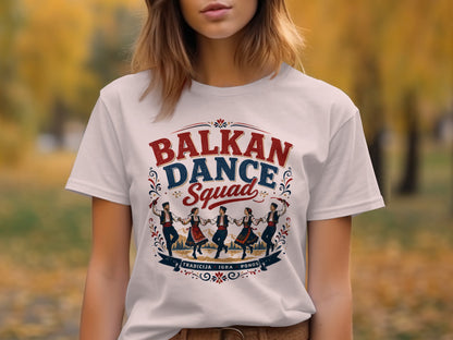 White t-shirt with "BALKAN DANCE Squad" text and traditional dancers at the bottom.