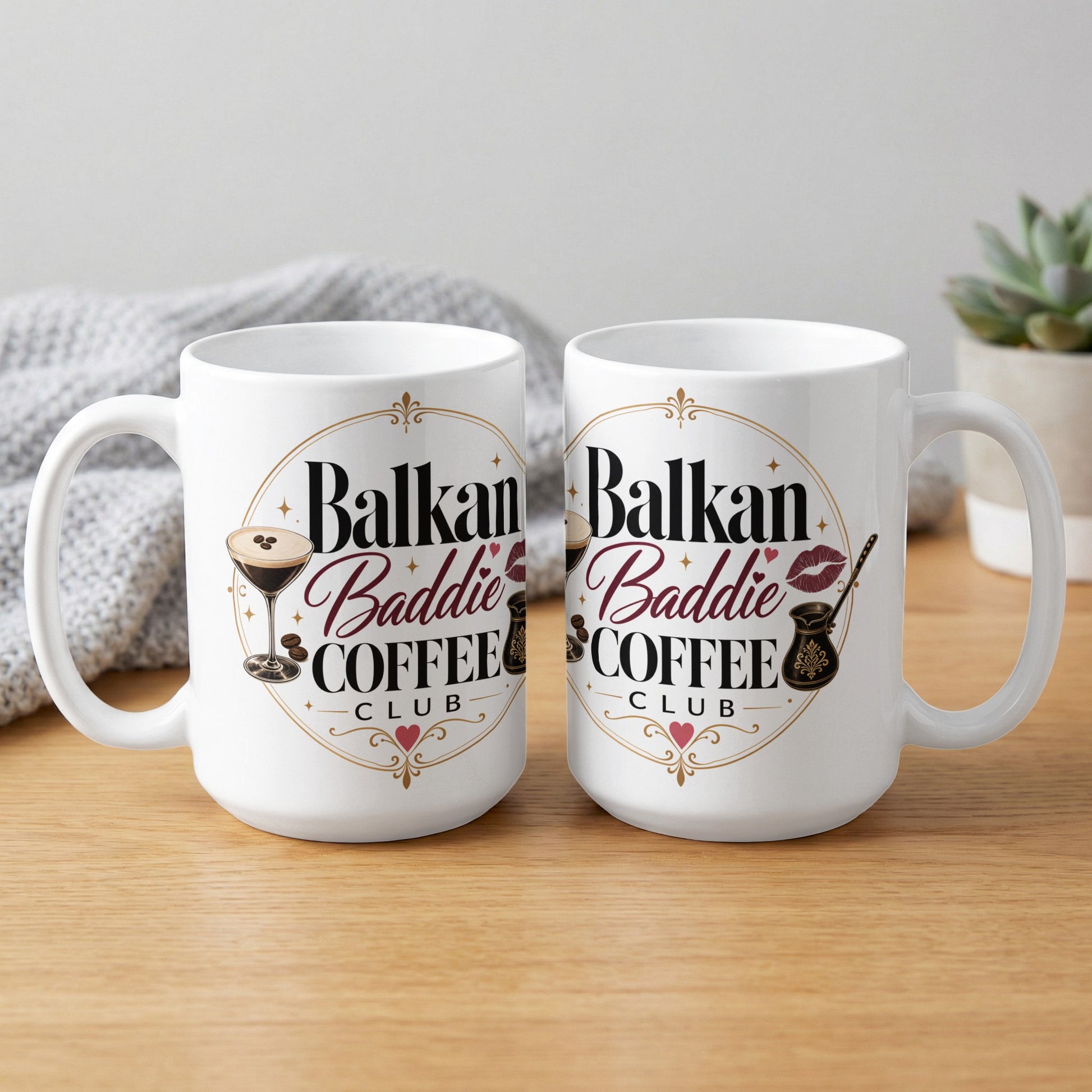 Two white ceramic mugs with "Balkan Baddie Coffee Club" text and heart graphic.