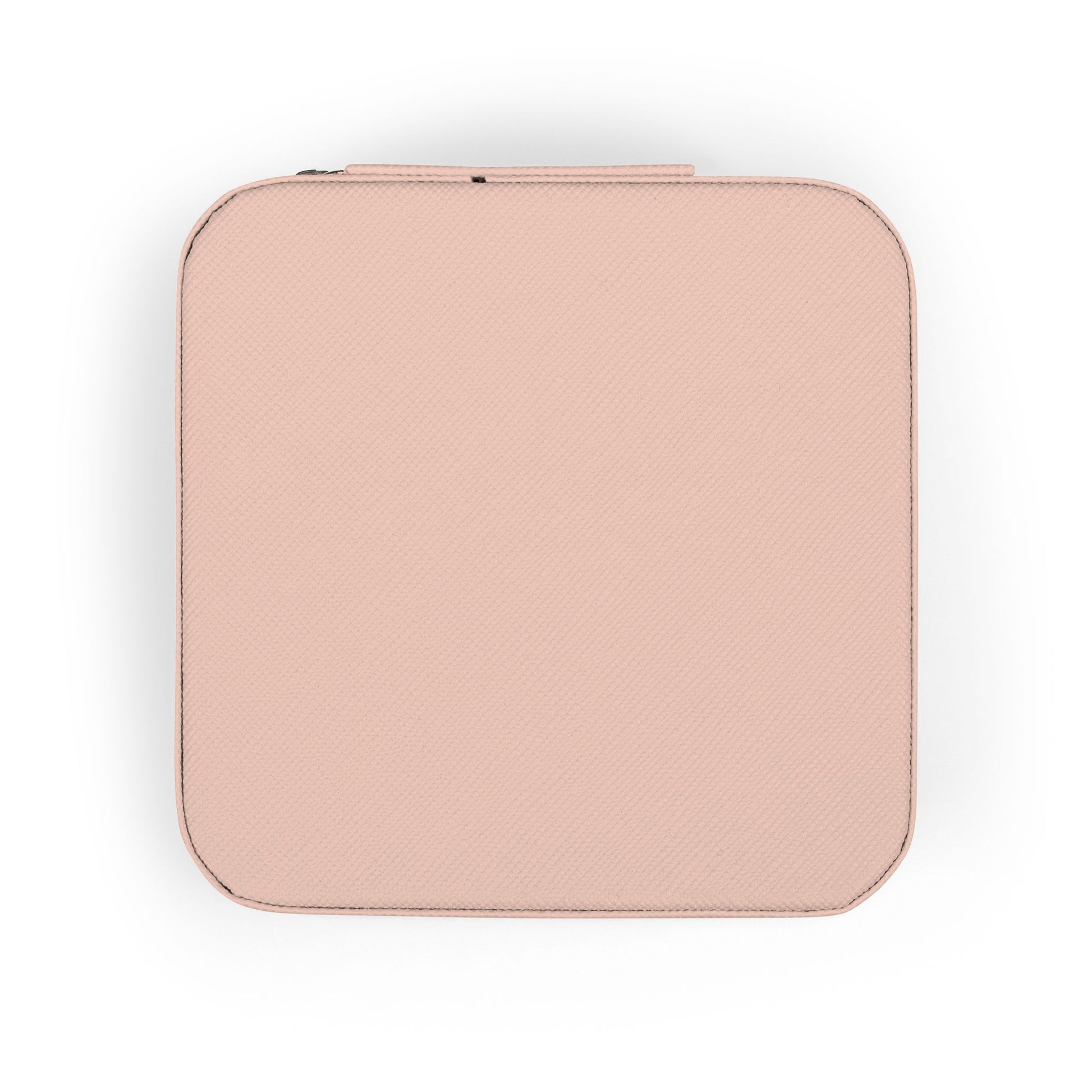 Closed peach textured square case with zipper detail on white background.