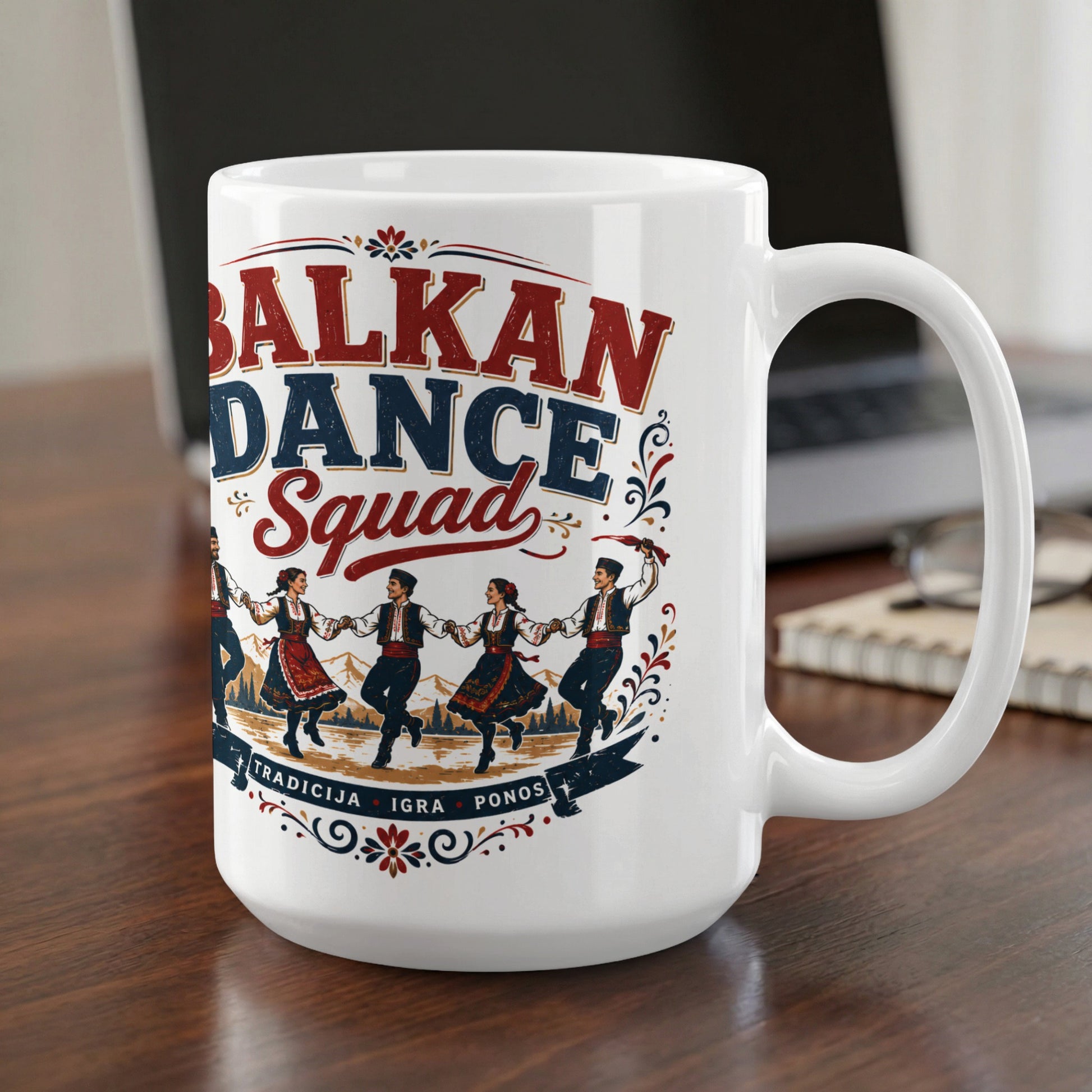 White mug with "Balkan Dance Squad" text and folk dancers in traditional dress.