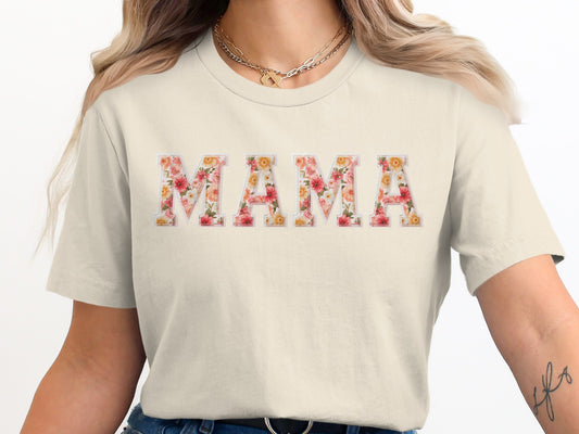 Cream t-shirt with floral "MAMA" graphic.