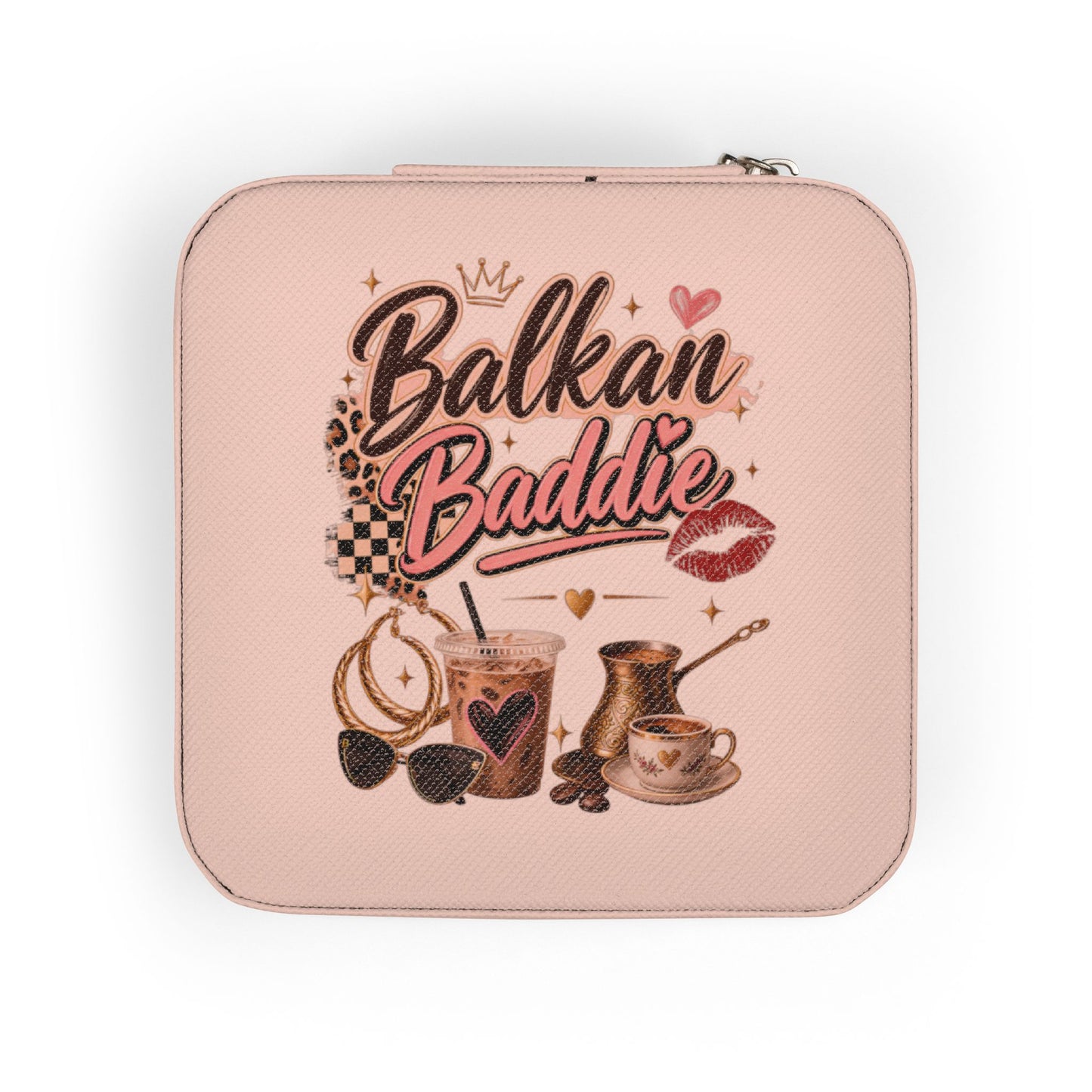 Pink jewelry box with "Balkan Baddie" text, coffee, and accessories.
