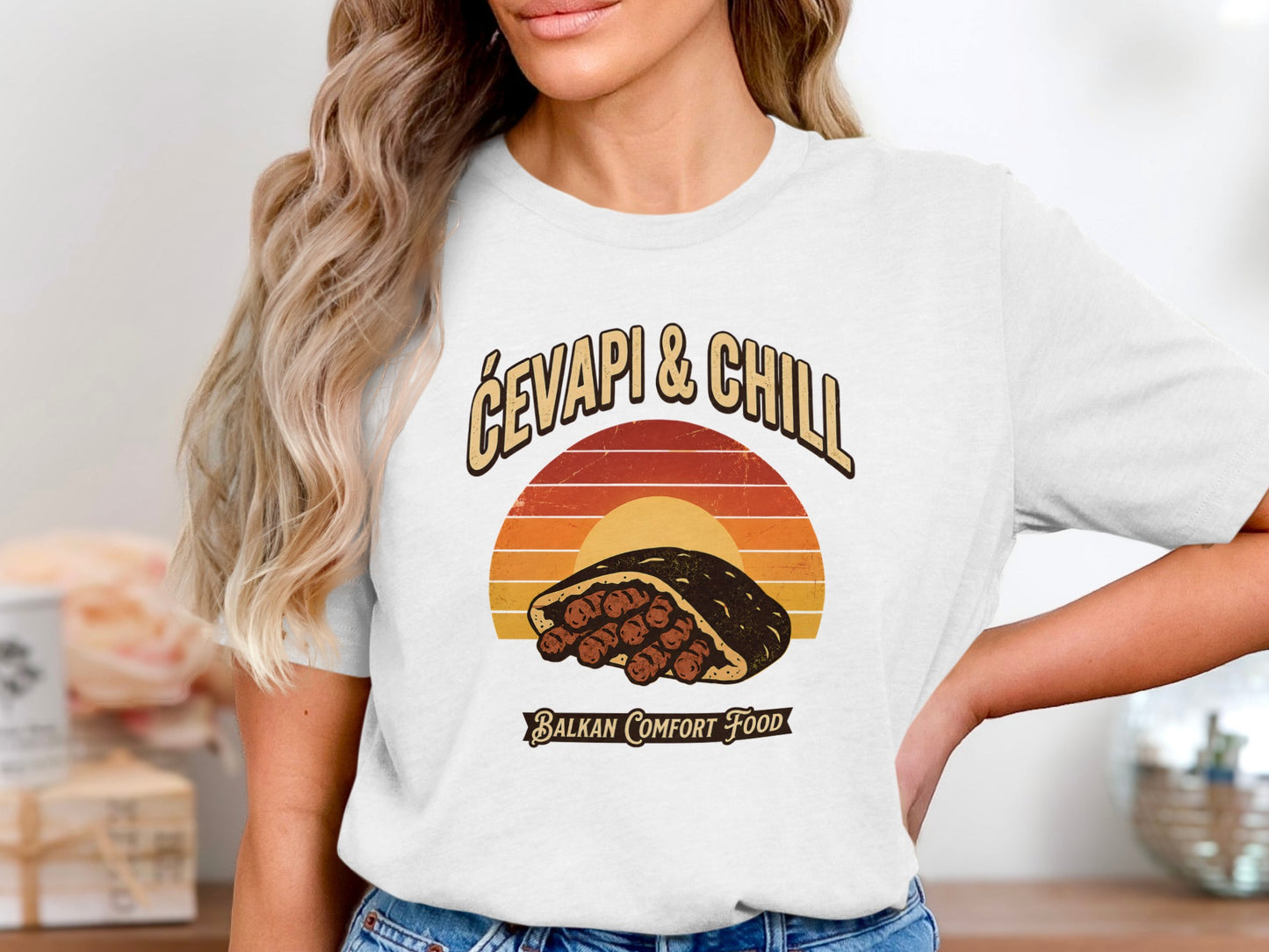 Graphic tee with "Ćevapi & Chill Balkan Comfort Food" text and food illustration.