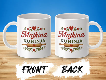 White mugs with red text "Majkina Kuhinja" and floral accents.