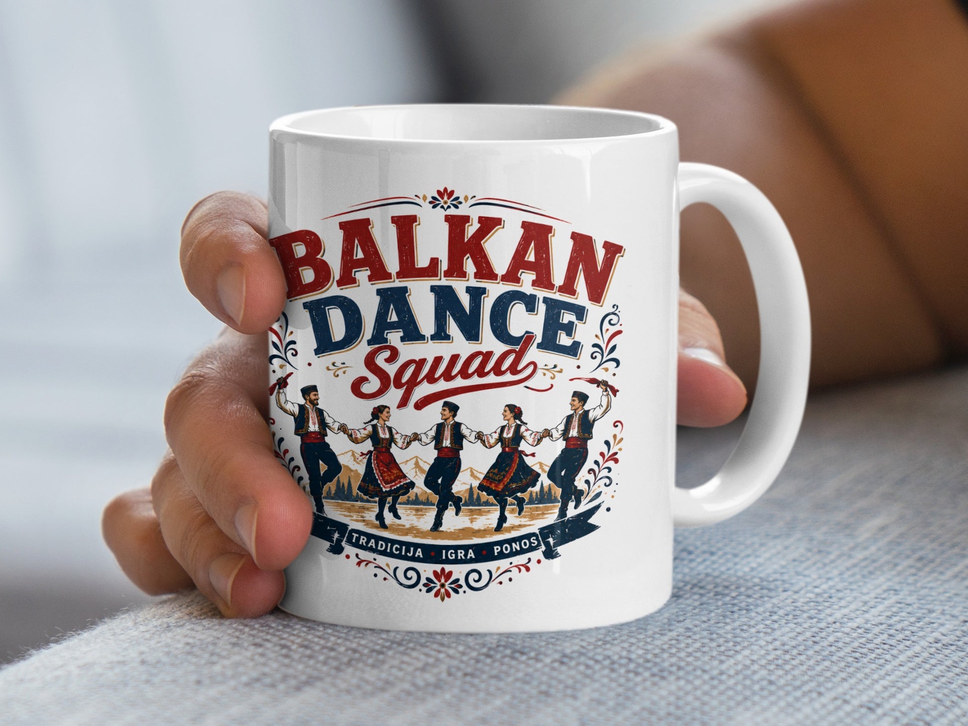 White mug with "BALKAN DANCE SQUAD" and folkloric dancers illustration.